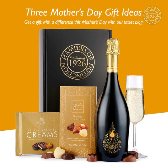 A blog cover with a bottle of prosecco as part of a gift box.